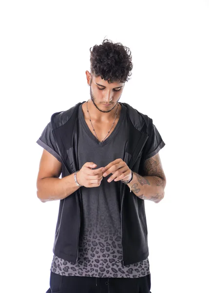 Tough young man in dark t-shirt isolated — Stock Photo, Image