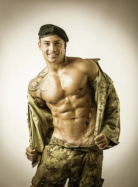 Muscular Man in Camo Pants and Jacket — Stock Photo, Image