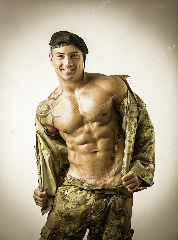 Muscular Man in Camo Pants and Jacket