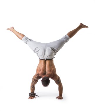 Male Acrobatic Dancer Balancing in Studio