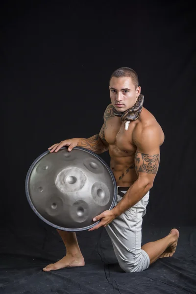 Male Drummer Drumming on Steel Drums in Studio — Stock Photo, Image