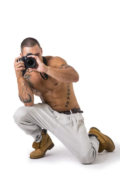 Shirtless young man with professional photo camera — Stock Photo, Image