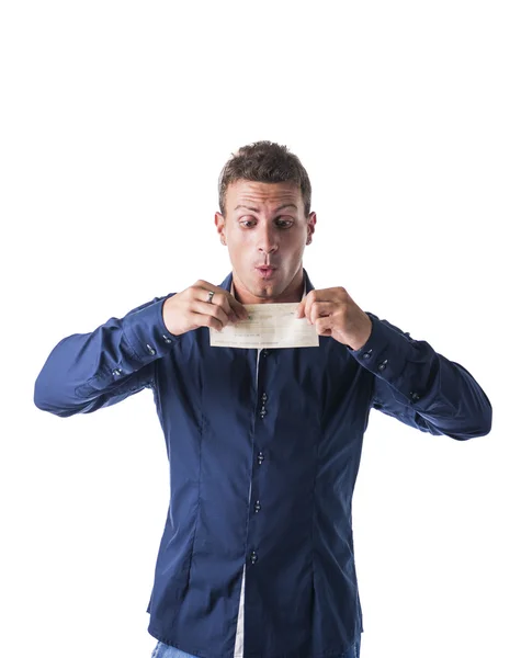 Smiling young man with check in his hands — Stock Photo, Image