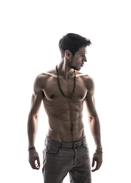 Handsome shirtless athletic young man on white — Stock Photo, Image
