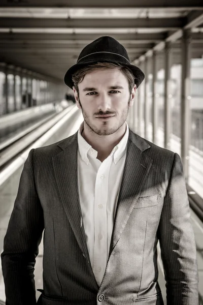 Man Wearing Hat and Looking Out Window — Stock Photo, Image