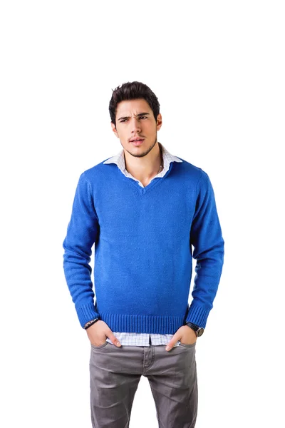 Smiling young man with wool sweater on white background — Stock Photo, Image