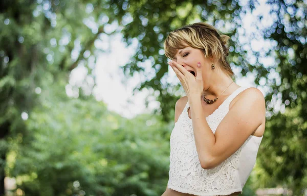 Bored or tired young woman yawning — Stock Photo, Image