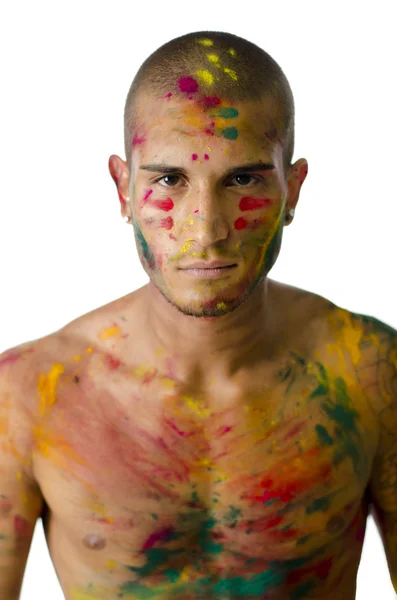 Schöner junger Mann mit Haut, alle mit Holi-Farben bemalt — Stockfoto