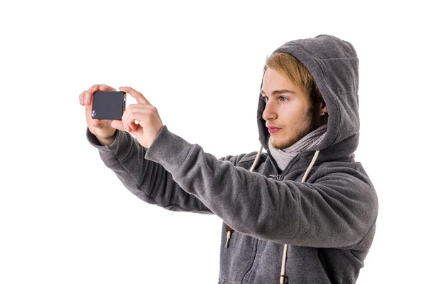 Giovane uomo prendendo selfie — Foto Stock