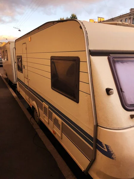 Beautiful white house on wheels on the street