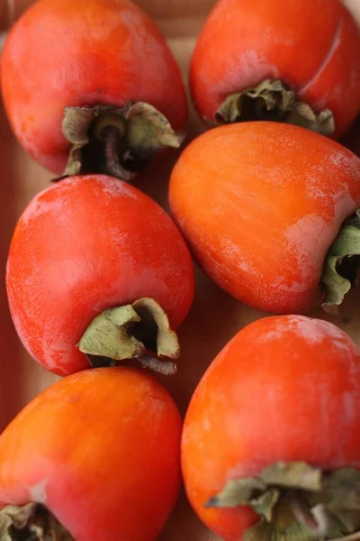 Ripe Juicy Persimmon Wooden Table — Stock Photo, Image