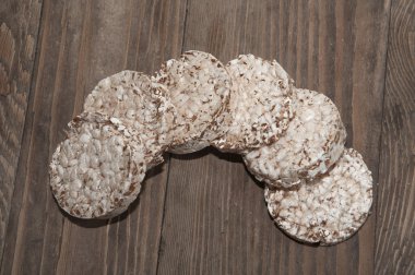 some dry bread on a wooden background