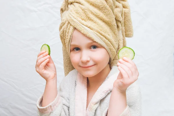 A girl in a bathrobe with a towel on her head — Stock Photo, Image