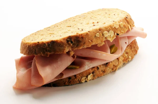 Nahaufnahme Auf Einem Sandwich Mit Mortadella lizenzfreie Stockfotos