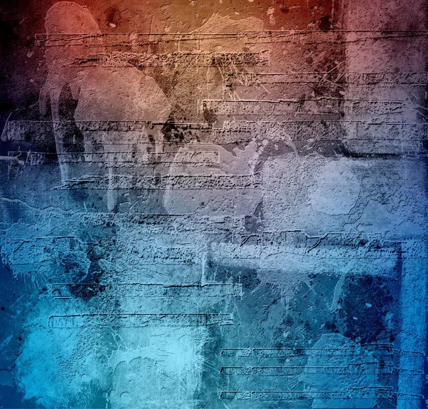 Warm and cool on a grunge wall. Orange and blue colors on rustic texture.