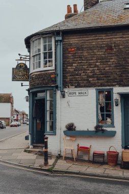 Rye, UK - October 10, 2020: Second hand items on sale outside The Runcible Spoon on Rope walk in Rye, one of the best-preserved medieval towns in East Sussex, England.