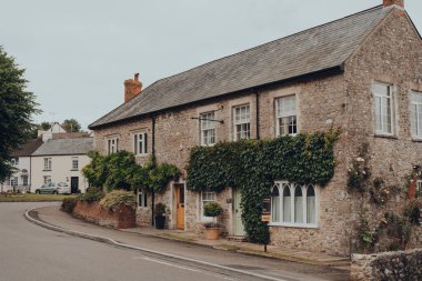 Combe St Nicholas, UK - July 25, 2020: Traditional English stone house in Combe St Nicholas, a village and parish in Somerset, on the edge of the Blackdown Hills Area of Outstanding Natural Beauty.