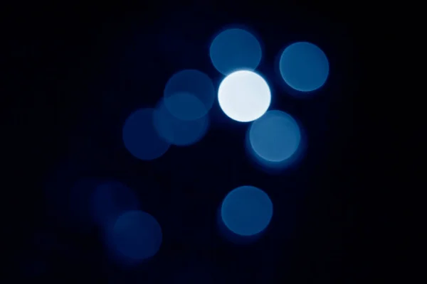 A blurry background with abstract blurry circles.
