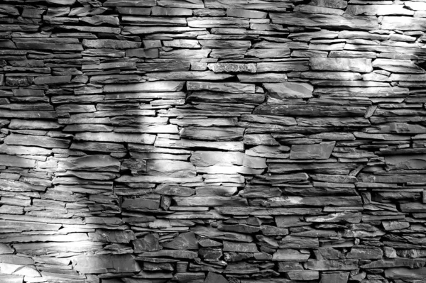 Στρώμα Από Επίπεδες Πέτρες Λίθινη Υφή Τοίχου Σκληρές Φωτεινές Κηλίδες — Φωτογραφία Αρχείου