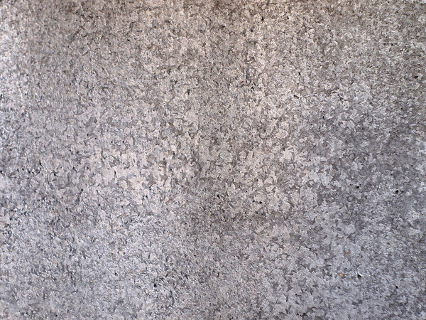 Grey metal background with seamless patter. Metal texture.