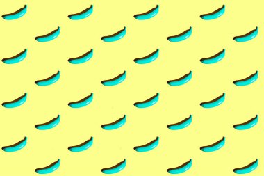 Sarı zemin üzerinde mavi muzdan yapılmış en az tekrarlanan patırtı.