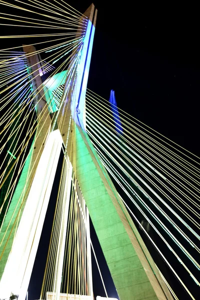 Bridge suspended on cables lit with LED lights — Stock Photo, Image
