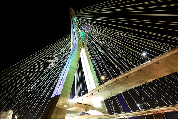 Bridge suspended on cables lit with LED lights — Stock Photo, Image