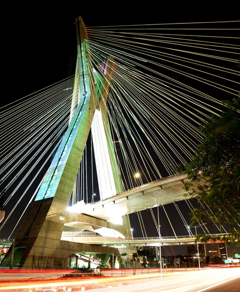 Bridge suspended on cables lit with LED lights — Stock Photo, Image