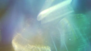 Hipnoz ışıltılı arka plan. Sihirli ışık sızıyor.