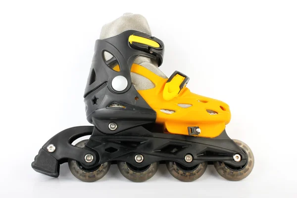 Yellow & Black Colored roller skates isolated on white — Stock Photo, Image