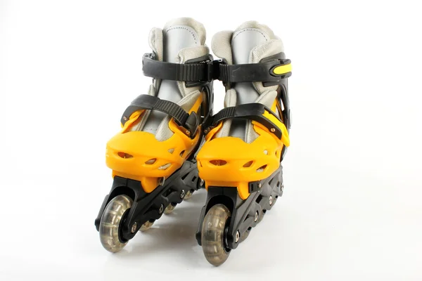 Yellow & Black Colored roller skates isolated on white — Stock Photo, Image