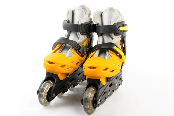 Yellow & Black Colored roller skates isolated on white — Stock Photo, Image