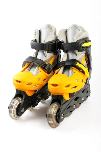 Yellow & Black Colored roller skates isolated on white — Stock Photo, Image