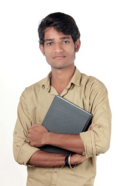 Güzel genç Hintli öğrenci bir günlük elinde tutan.