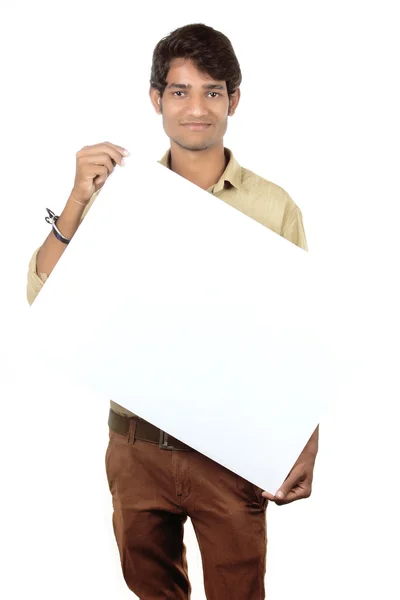 Close-up portrait of happy indian man under blank banner — Stock Photo, Image