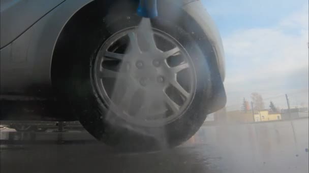 High Pressure Water Jet Removing Dirt Car Wheels — Wideo stockowe