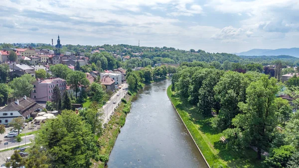Olza river on a border between Poland and Czech Republic. View from bird sight. City from drone.
