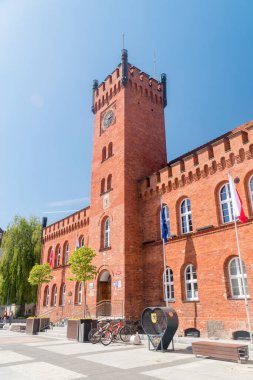 Szczecinek, Poland - May 31, 2021: Tower of Town Hall at the marketplace.