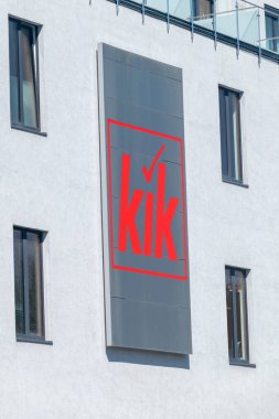 Szczecinek, Poland - May 31, 2021: Logo and sign of the German textile discount store chain KIK.