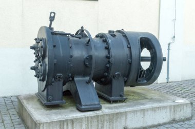 Walbrzych, Poland - June 3, 2021: Reciprocating compressor cylinder in a mine shaft at old coal mine in Walbrzych.