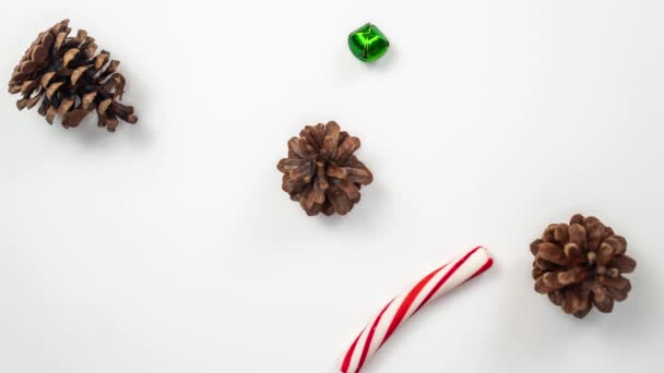 Beautiful Holiday Background Loop Pine Cones Candy Cane Sticks Green — Vídeos de Stock