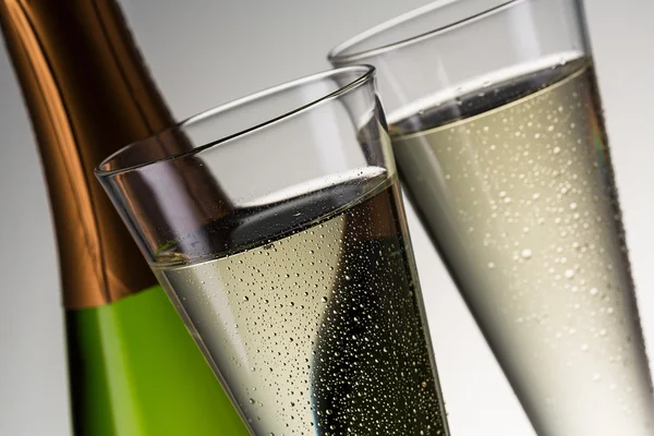 Luxury champagne with dewdrops and bottle — Stock Photo, Image