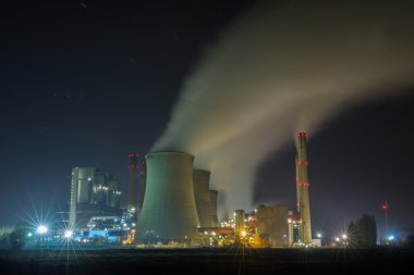 industrial coal power station at night  clipart