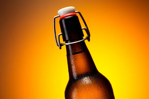 Cold beer bottle with dew drops — Stock Photo, Image