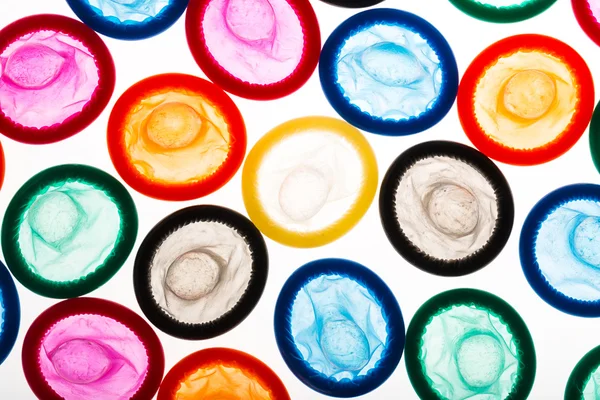 Condoms in different colors — Stock Photo, Image