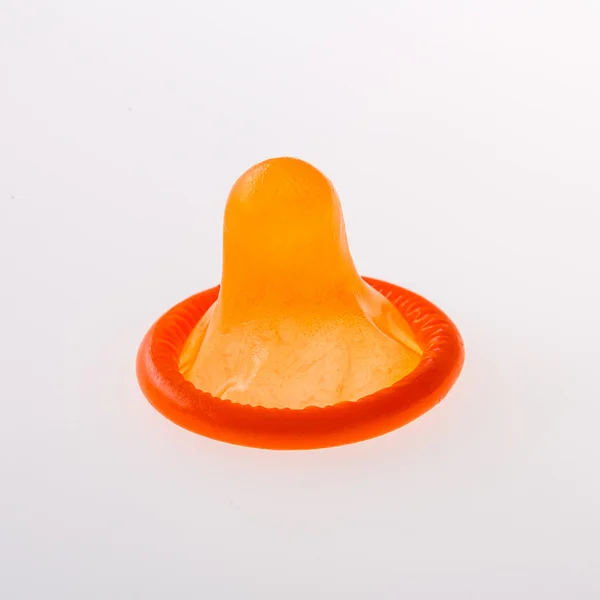 Oranje condoom — Stockfoto