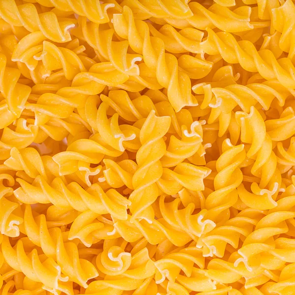 Niegotowane fusilli — Zdjęcie stockowe