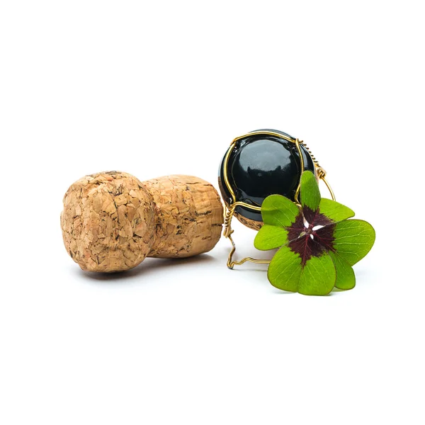 Lucky Clover met champagne kurken — Stockfoto