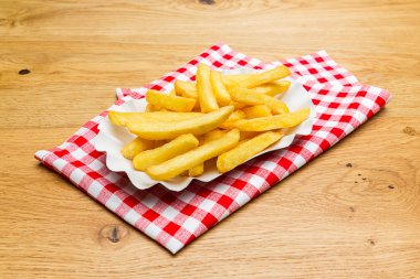 german fries on a tablecloth clipart