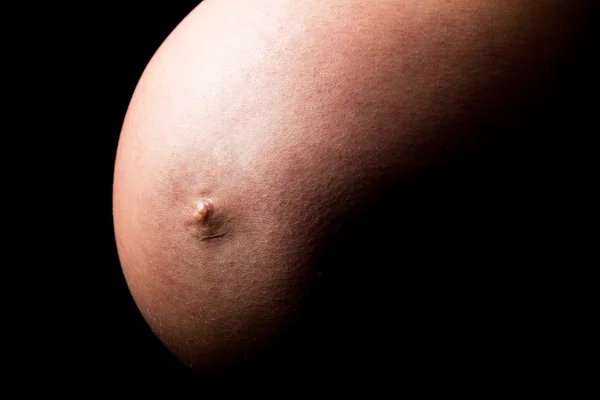 Barriga de mulher grávida — Fotografia de Stock